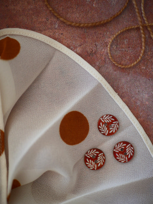 Bouton couronne orange nacré