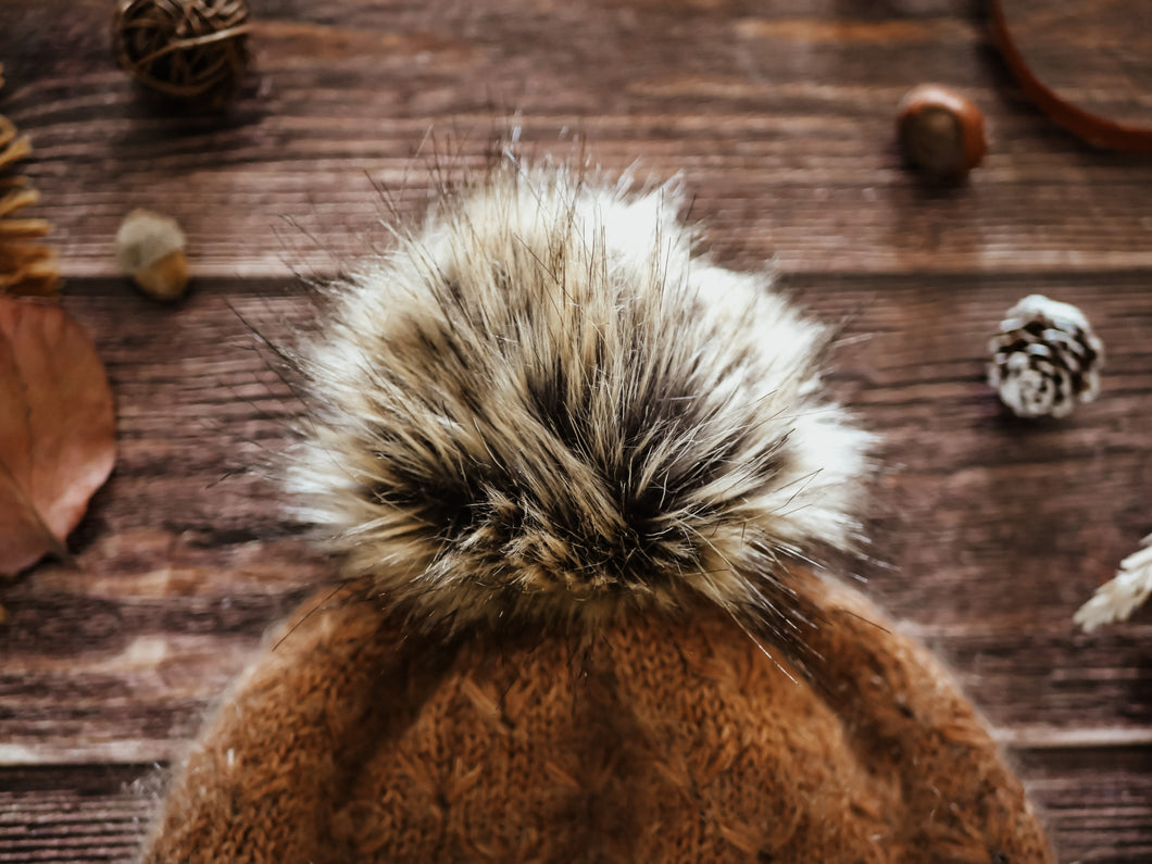 Pompon raccoon en fausse fourrure