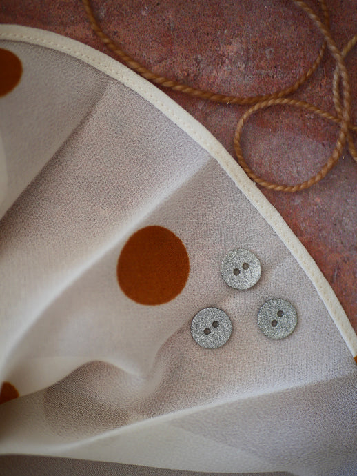 Mini Bouton argenté à paillettes