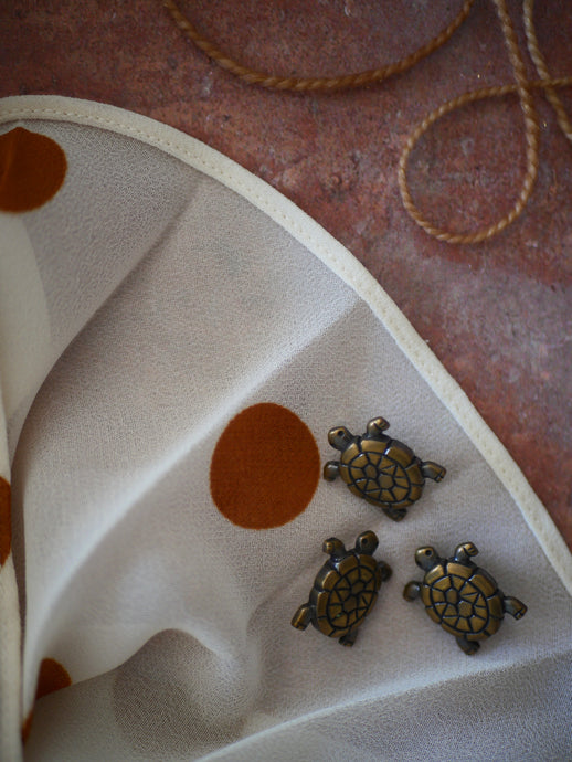 Bouton tortue métal